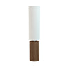 Table lamp with a wooden base and white shade on a light gray background